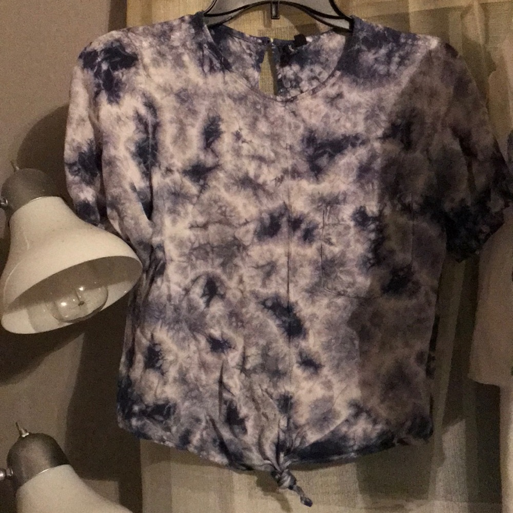 Cropped up with pocket and tied at the bottom
